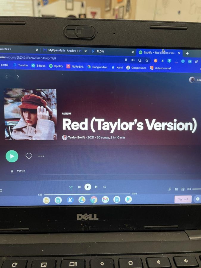 Red (Taylors Version) is seen being played from a computer.