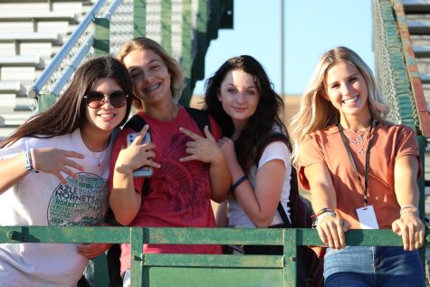 Sophomores Cheryl Grubbs, Torrie Johnson, Avery Jones and Kaylee Parrish hanging out at a JV football game last fall.