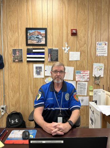 Officer Stutsman at his desk.