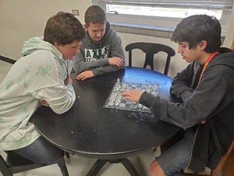 Group of students playing chess at the chess club meeting on Oct. 18.