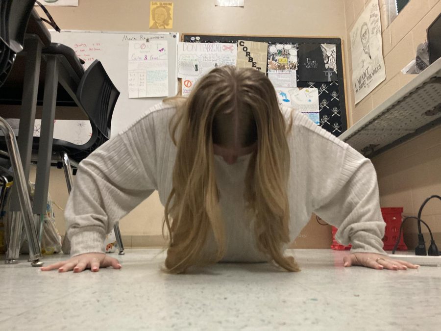 Hanna Gibson practicing her push-ups.