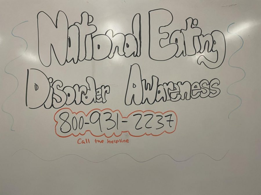 National+Eating+Disorder+Awareness+with+the+Eating+Disorder+Helpline+is+written+on+a+whiteboard.