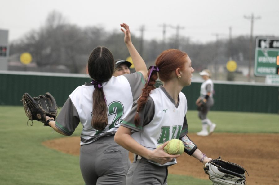Lady hornet softball during their district game.