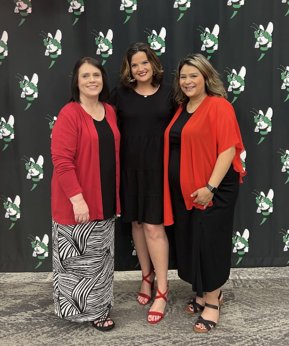 Laura Woody (center) posing with her fellow FCCLA Advisers, Natasha Deramee (left) and Samantha Baker (right) at the 2023 FCCLA Banquet. Photo courtesy of Azle FCCLA