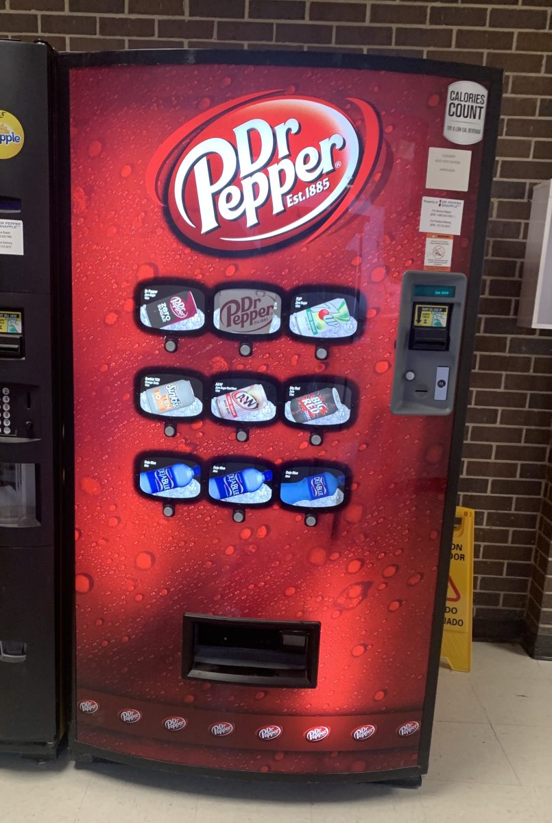 The vending machine located near SL hall that offers students diet soda options.
