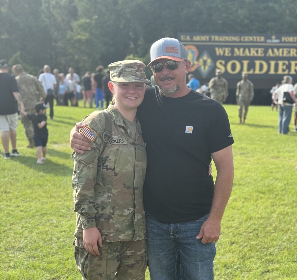 Senior Cheyenne Vickers (left) with her Dad, Clay Vickers, (right) at Cheyenne Vickers' graduation ceremony from Basic Training Program in the Army. Photo courtesy of Cheyenne Vickers