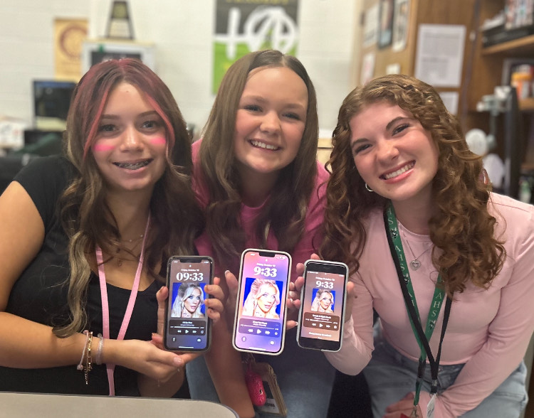 Sophomores Zoe Hopton, Raegan Holland and Brinley Dowell all listen to Megan Moroneys new trio of songs.