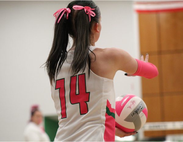 Jacqueline McClain serves during the Oct. 18 game against the Aledo Bearcats