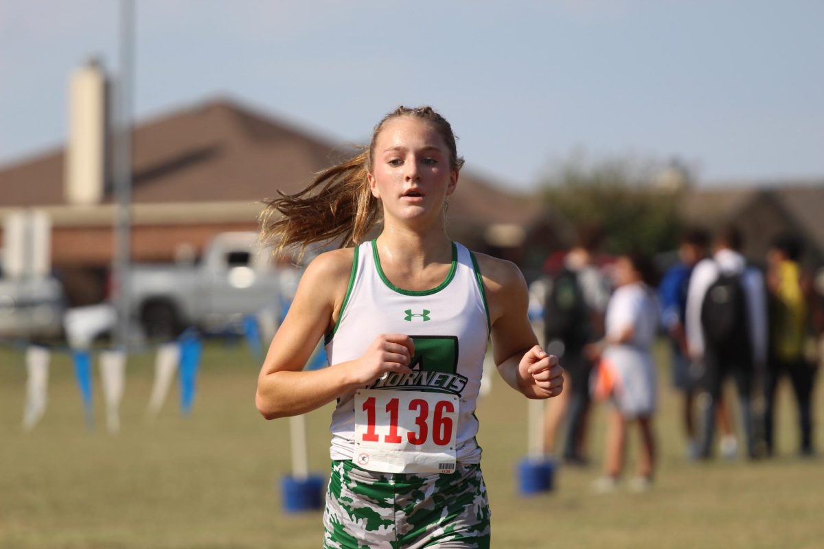 Noah Kovach runs to the finish line.