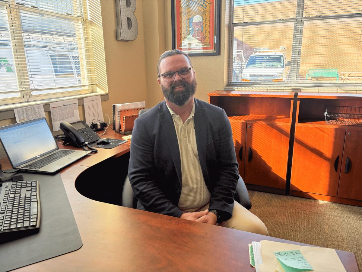 Mr. Bell in his A-Hall office.