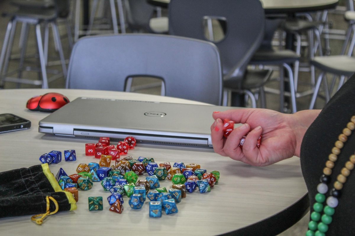 ASL teacher Nikki Self rolls the dice to decide a student’s fate.