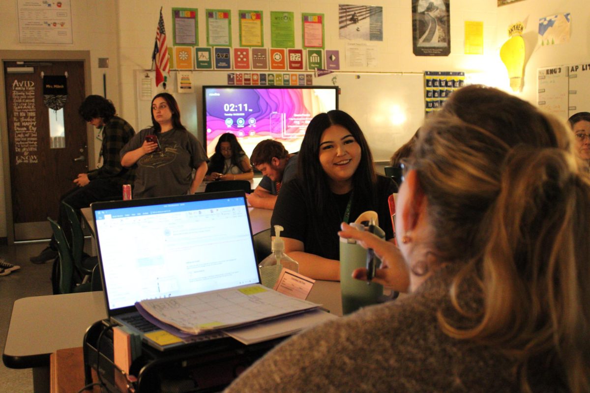 Marian Maldonaldo talks to Mrs. Milosh.