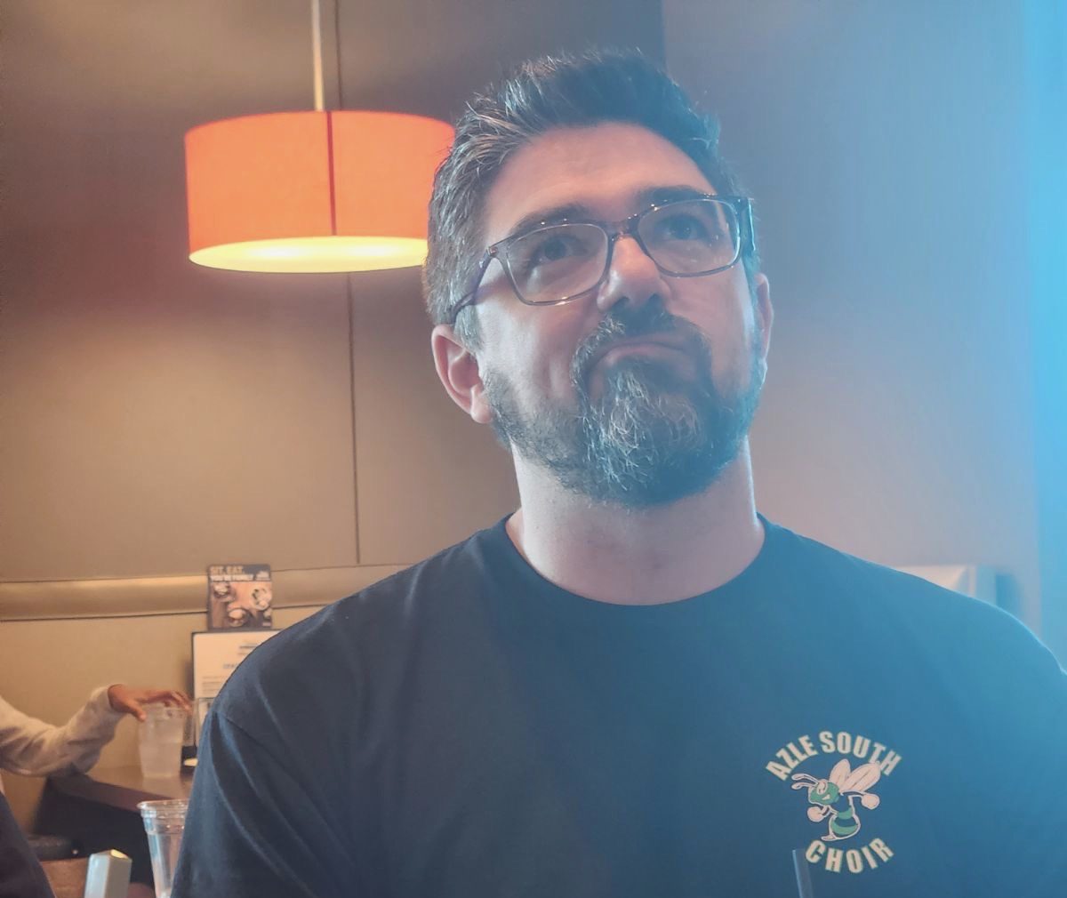 Mr. Moss ponders what to order for dinner. Courtesy of Riley Rahim.