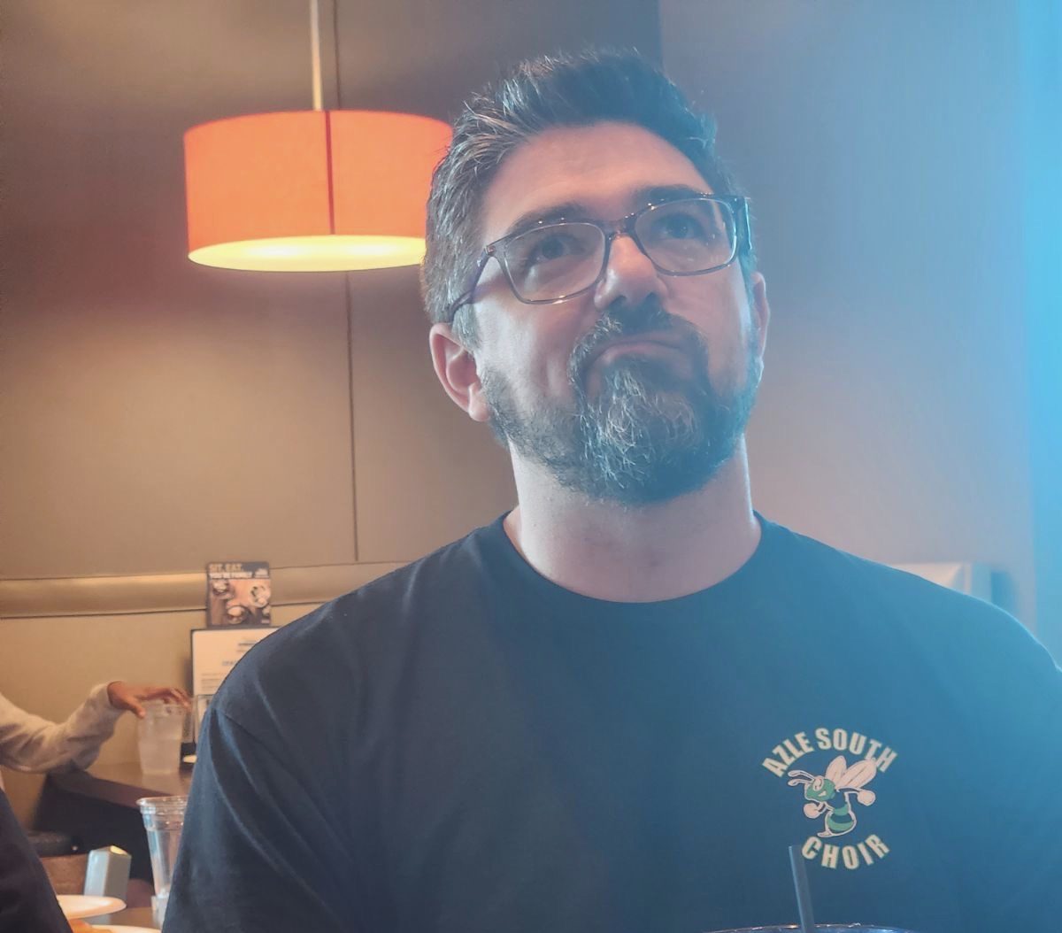 Mr. Moss ponders what to order for dinner. Courtesy of Riley Rahim.