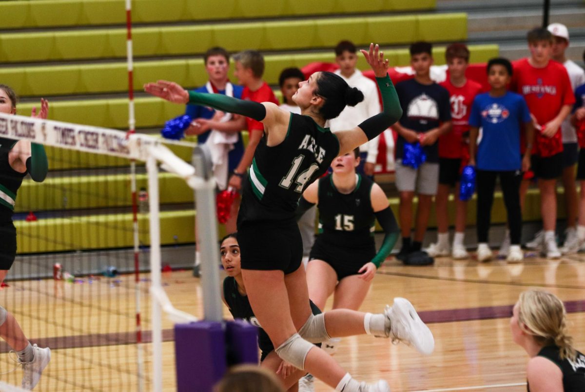 Junior Jacqueline McClain goes for the kill.