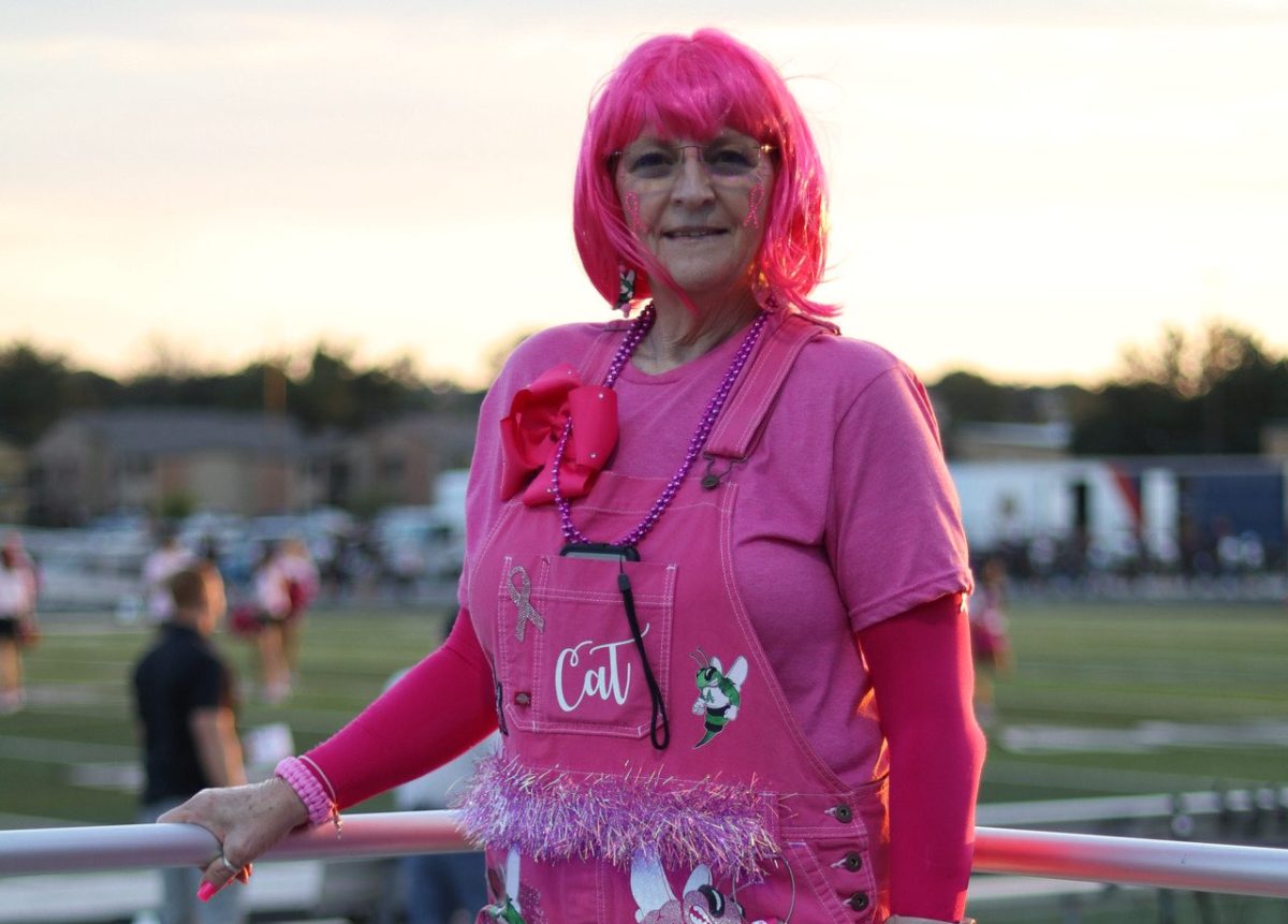 Cathy Markham, Breast Cancer Survivor and Special Education teacher decked out in pink during last year's Pink Out football game. Courtesy  of Cathy Markham.