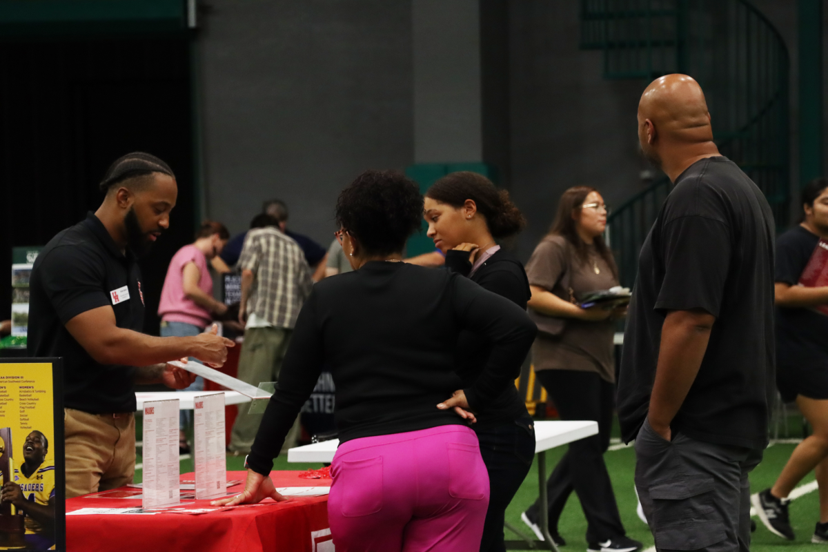 Senior Jurnee Byrd and her parents visited with a number of schools during the college fair on Sept. 25.