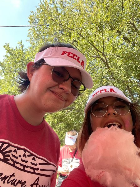 Seniors Gabrielle 'Gabby' Currid and Alexia Alonso, then sophomores, at Sting Fling after Alexia asked Gabby to buy her cotton candy. Courtesy of Alexia Alonso.