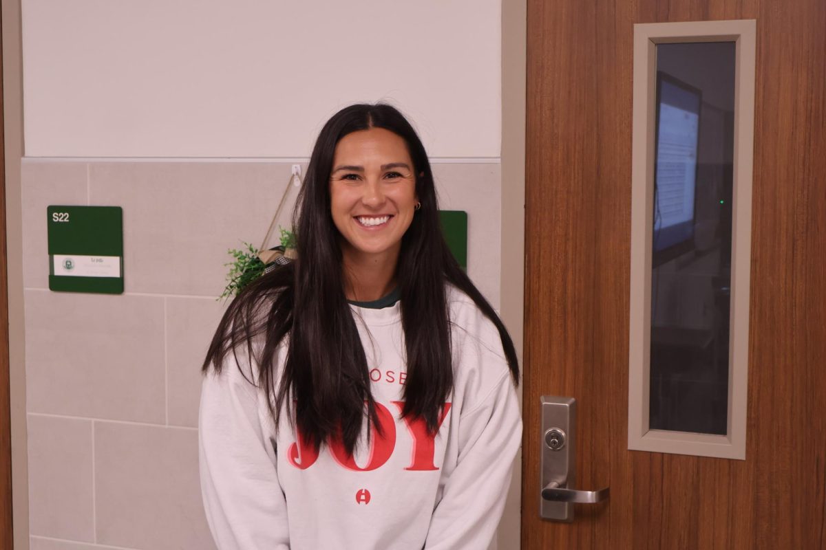 Tiffany Thayer outside of her classroom in the S-Hall.