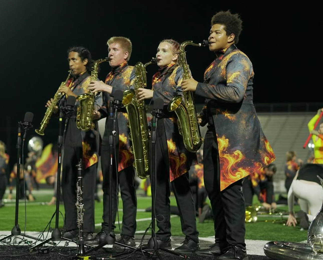 Senior Nicolas Renteria, Junior Ethan Kacmarynski, Sophomore Abigael McCoy, and Senior Jaden Petty perform their quartet at homecoming 
