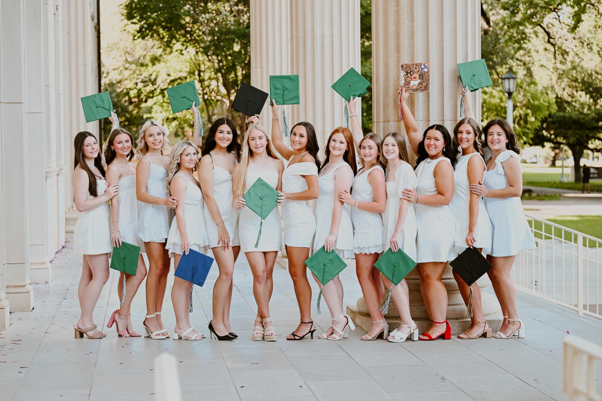 A group of seniors with their graduation caps. Photo courtesy of Brysen Rae Photography.
