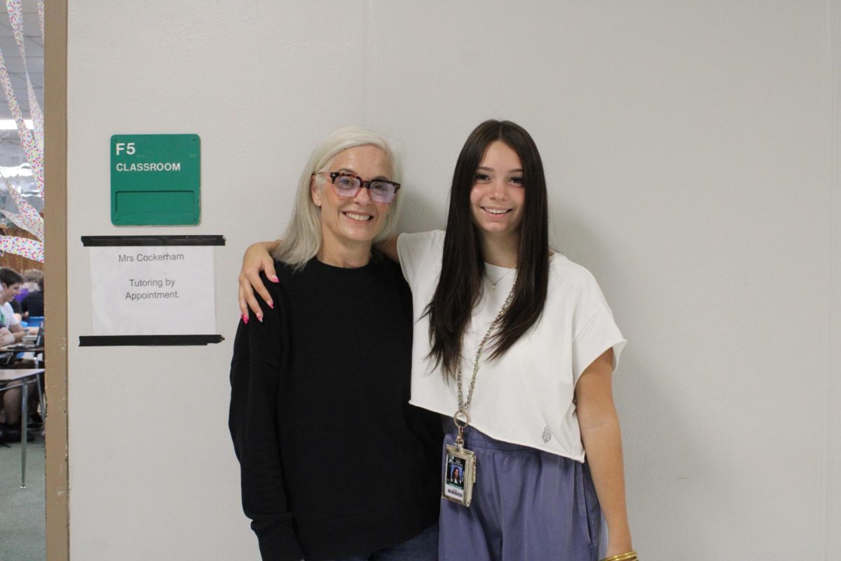 Mrs. Cockerham with junior Brinley Dowell outside her F-Hall classroom.