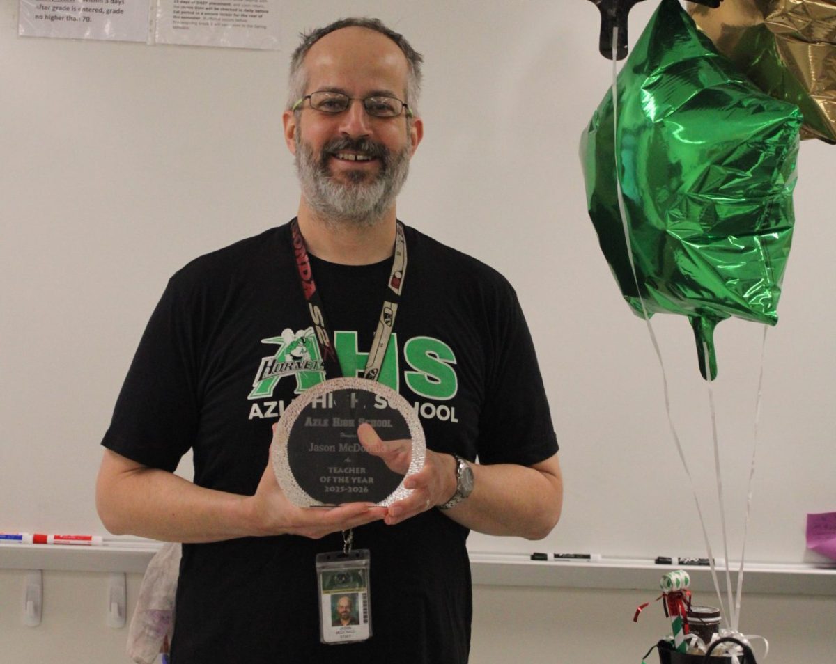 Mr. McDonald with his Teacher of the Year Award.