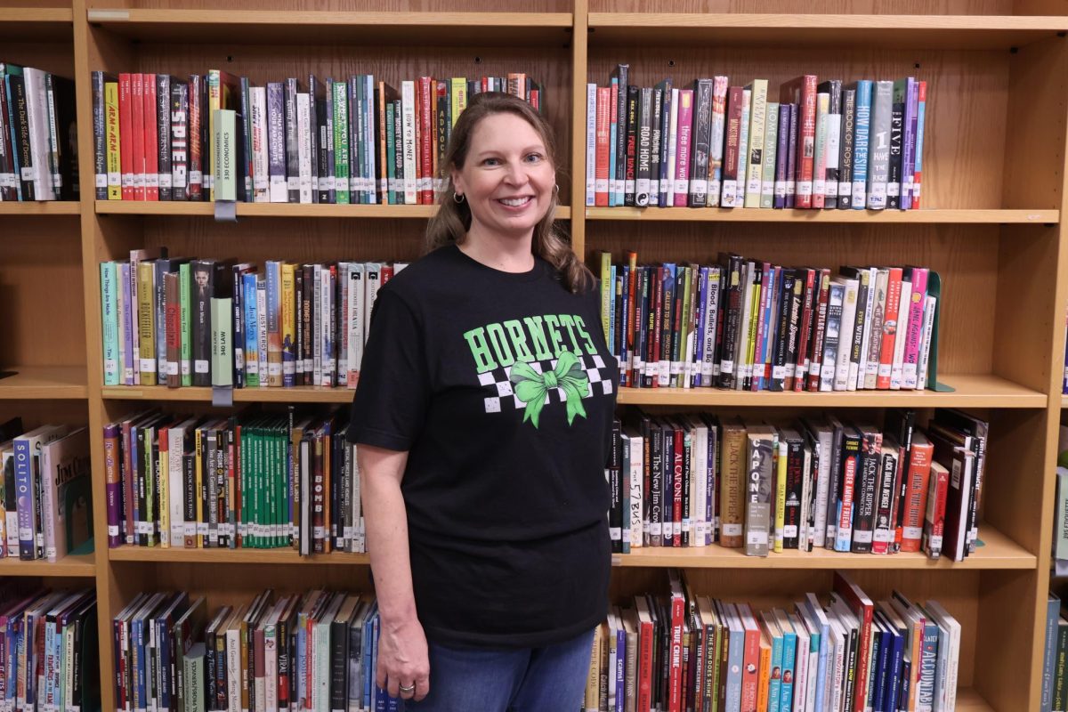 Mrs. Stroud in her element amongst the stacks.