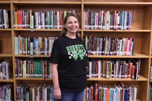 Mrs. Stroud in her element amongst the stacks.